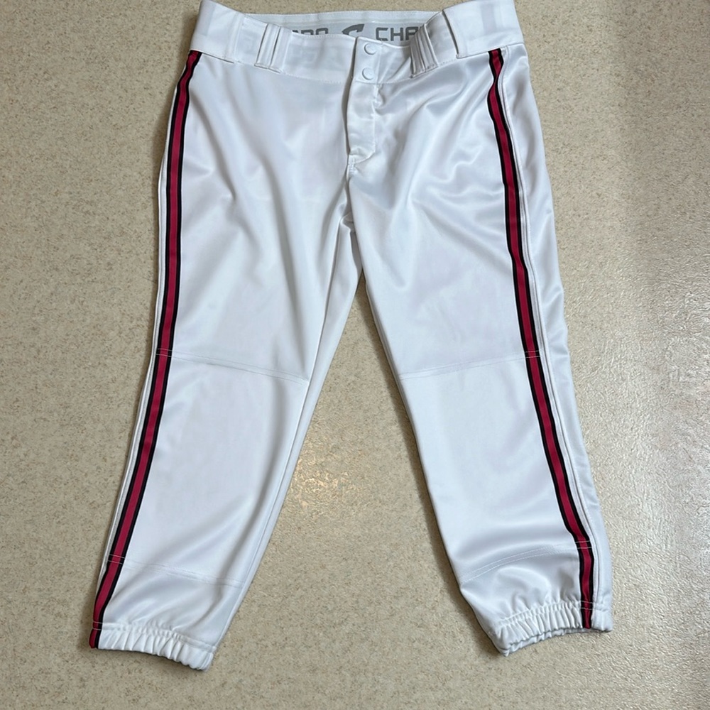 Women’s Champro softball pants size large. White with pink stripes.